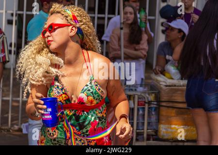 Goiânia, Goias, Brazil – September 05, 2022: A blonde-haired woman dancing during the LGBTQIA+ Pride Parade. Stock Photo