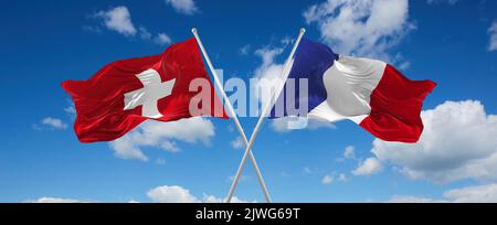 crossed national flags of France and switzerland flag waving in the ...