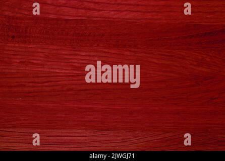 A Dark Red Wood Grain Background Stock Photo