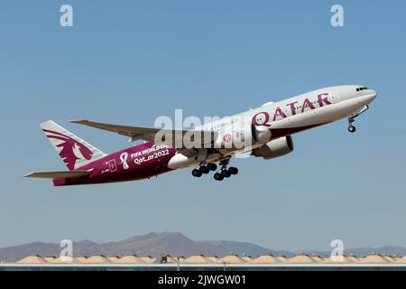 Malaga, Spain. 21st Aug, 2022. A Qatar Airways Boeing 777-200LR in special livery 2022 Qatar football world cup, climbing out Malaga Costa del Sol airport.Qatar Airways is the state-owned flag carrier airline of Qatar headquartered in Doha. (Photo by Fabrizio Gandolfo/SOPA Images/Sipa USA) Credit: Sipa USA/Alamy Live News Stock Photo