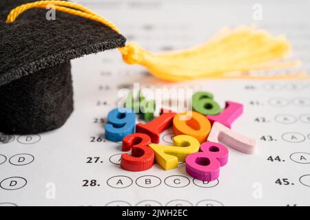 Math Number colorful with graduation hat and pencil on Answer sheet ...