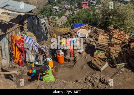 LALIBELA, ETHIOPIA - MARCH 29, 2019: Local women doing laundry in Lalibela village, Ethiopia Stock Photo