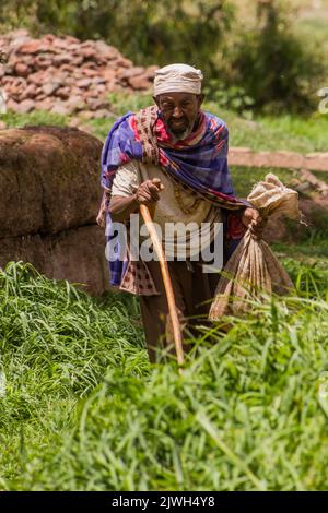 LALIBELA, ETHIOPIA - MARCH 29, 2019: Local man walking in in Lalibela, Ethiopia Stock Photo