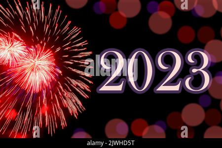 Happy new year 2023, festive red fireworks on background black sky with bokeh and copy space. Concept of holiday Stock Photo