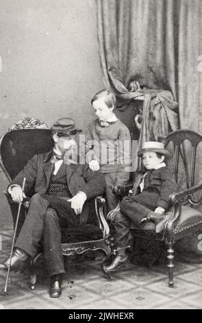 Willie and Tad Lincoln, sons of President Abraham Lincoln, with their cousin Lockwood Todd, Photo by Mathew Brady. Both these young boys would die before eaching adulyhood - Tad died at 18 (poosibly from TB) and William died at 12 from typhoid fever. Stock Photo