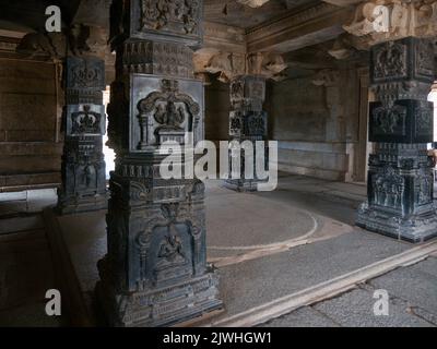 Inside the main mandapa of Hazara Rama temple   are four intricately carved pillars in the Hoysala style at Hampi state Karnataka india 08 07 2022 Stock Photo