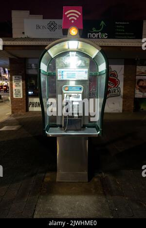 Telstra public phone booth in Palm Court, Murwillumbah, northern new south wales, australia, taken at night Stock Photo