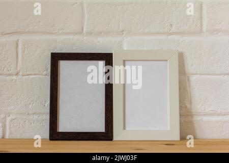 Empty photo frames on the table with copy space Stock Photo