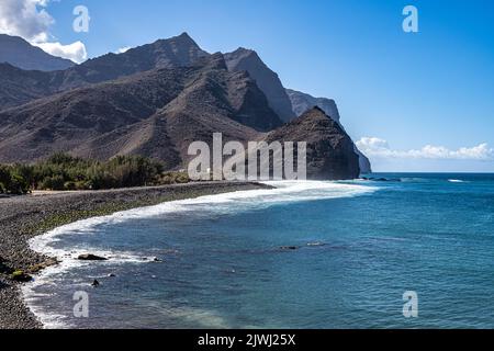 View of the port and beach Puerto de la Aldea of the Village of San Nicolas in Gran Canaria in Spain Stock Photo