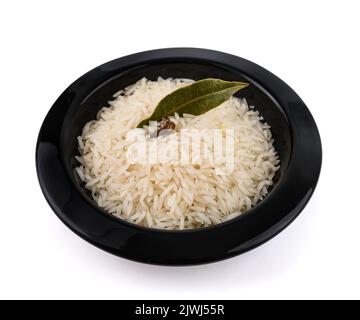Basmati rice in a dish isolated on  white background. Stock Photo