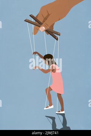 Hand controlling girl on puppet strings Stock Photo