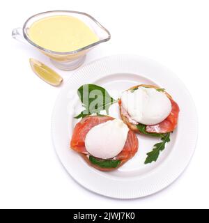 Isolated Egg Benedict With Salmon And Toasts Stock Photo - Alamy