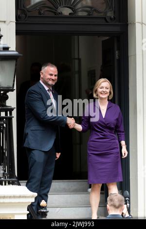 Newly elected Conservative leader and Prime Minister Liz Truss entering the party campaign headquarters following the winning announcement Stock Photo