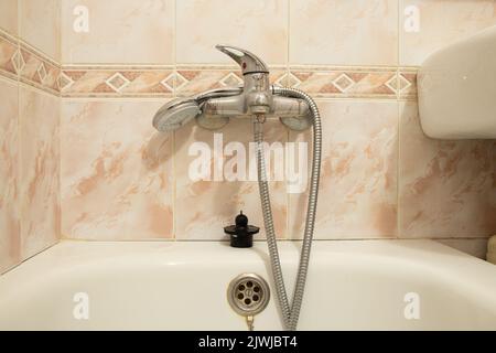 Inside the bathroom , faucet and shower mixer in the bathroom , bathroom in a residential apartment , bathroom interior Stock Photo