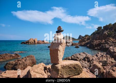 Its waters are crystal clear and of a changing blue due to the plays of light created by the sun reflecting off the sea bed. Stock Photo