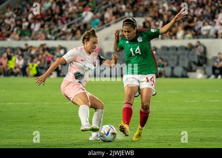 Angel City FC midfielder Savannah McCaskill (9) and Mexico midfielder Jacqueline Ovalle (14) fight for possession during the Copa Angelina, Sunday, Se Stock Photo