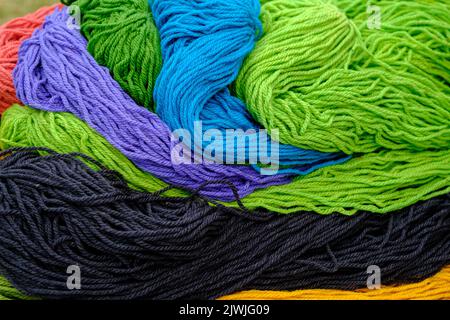 Sheep's wool threads, threads of different colors in large quantities, handmade Stock Photo