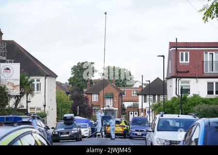 Forensics officers at the scene in Kirkstall Gardens, Streatham Hill ...