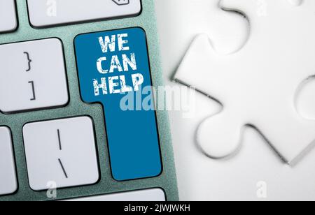 We Can Help. Text on a computer keyboard button. Stock Photo