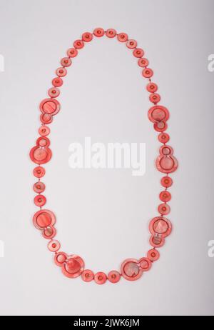 women necklace made of orange colored sea shell, beautiful craft work for women accessories isolated on white background Stock Photo