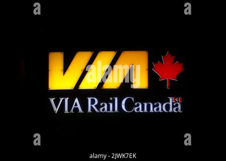 VIA Rail Canada Logo Banner at the Halifax Inter-city Railway Station. Halifax forms the eastern transcontinental. HALIFAX, NOVA SCOTIA, CANADA Stock Photo