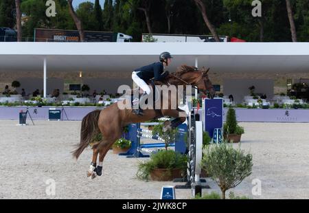 Horse jumping during equestrian competition. Rome, Italy, 2-4 september 2022, Equestrian Jumping Championship Stock Photo