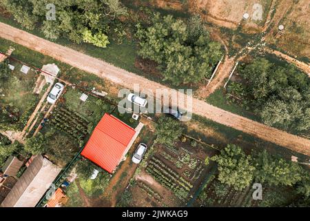 Top-down view over rural village  and contryside road in Europe Stock Photo