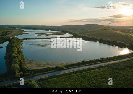 Aerial view of fish hetching pond with blue water in aquacultural area Stock Photo