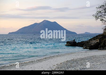 Indonesia Alor Island - Coastline view with vulcano mountain Stock Photo