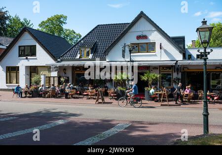 Norg, Drenthe, The Netherlands, 07 20 2022 - Restaurant with sunny terrace along the road Stock Photo