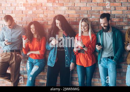 Millenial Using Technology millennial generation modern devices technology Stock Photo - Alamy