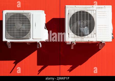 air conditioning unit Central split system hanging outside the building Stock Photo