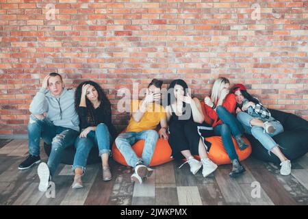 millennials hang out relaxing lounge area bored Stock Photo