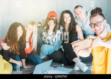 guy smartphone group selfie youth team creativity Stock Photo