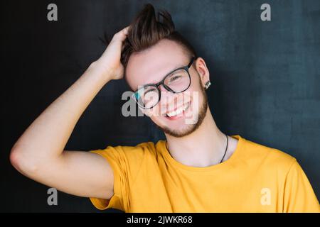millennial portrait happy smiling bearded hipster Stock Photo