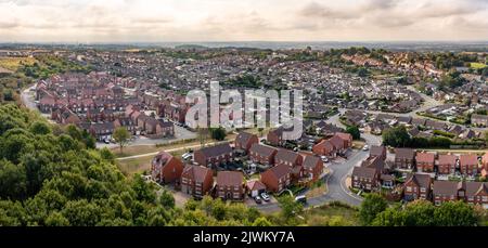 KIPPAX, LEEDS, UK - SEPTEMBER 2, 2022.  Aerial view of a new build housing development on the outskirts of a village in a housing expansion concept Stock Photo