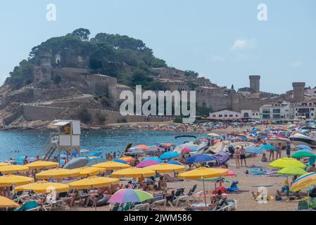 Catalonia in Spain: the beach at the pretty resort of Tossa de Mar Stock Photo
