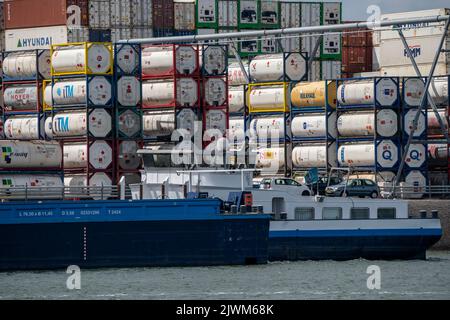 Europoort, Pernis, container storage in Rotterdam-Botlek, standard TEU containers and liquids, chemical tank containers, on the Oude Maas Canal, tanke Stock Photo