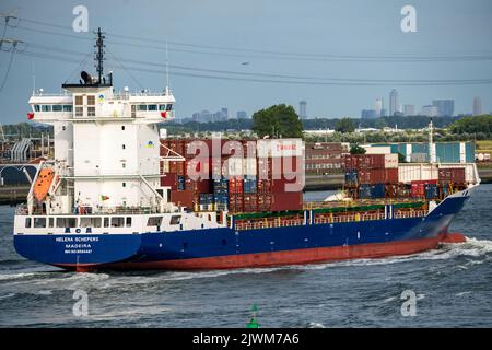 Shipping traffic on the Maas, height Hoek van Holland, freighter Helena Schepers, skyline of Rotterdam Stock Photo