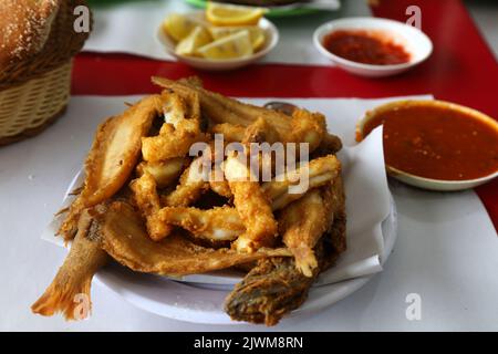 Mixed fried fish. Moroccan food. Cuisine of Morocco. Stock Photo