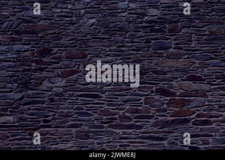 Dark texture. Black night stone wall background. Stock Photo