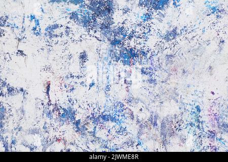 Old wall background. Layers of blue paint. Scratched paint layers weathered texture. Stock Photo