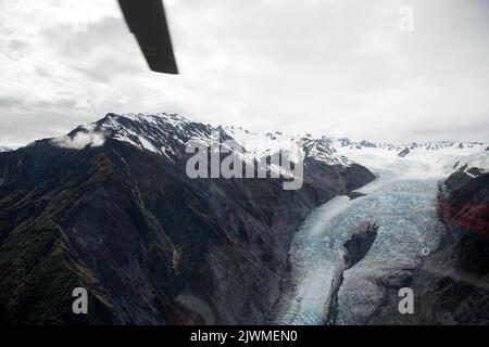 Fox Glacier view in New Zealand from a helicopter window Stock Photo