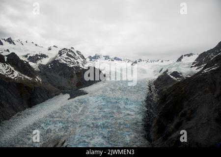 View from the helicopter over Fox Glacier in New Zealand Stock Photo
