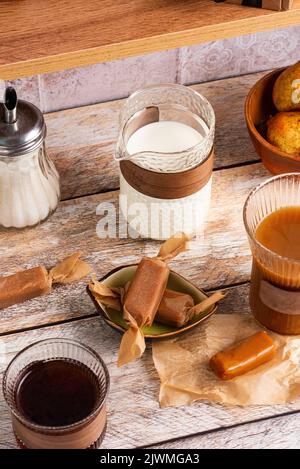 handmade caramel candies on the kitchen table. Stock Photo
