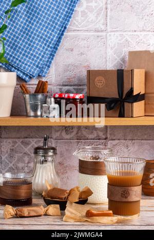 handmade caramel candies on the kitchen table. Stock Photo