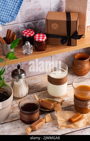 handmade caramel candies on the kitchen table. Stock Photo