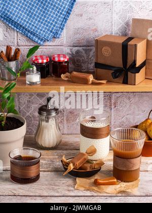 handmade caramel candies on the kitchen table. Stock Photo