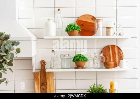 artificial plants in a bright kitchen Stock Photo