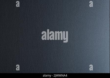 Black gradient leather background flat plane close up view Stock Photo